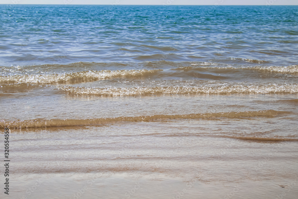 Empty sand beach with wave background. Summer Vacation Travel and Holiday concept,mandavi kutch Gujarat beach view,White sand beach and blue sky. beach view Empty sand beach with wave background. Summer Vacation Travel and Holiday concept,mandavi kutch Gujarat beach view,White sand beach and blue sky. beach view