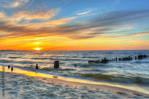 Beautiful beach of the Baltic Sea at sunset in Gdansk, Poland