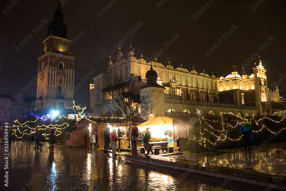 Fantastic view of the night winter KRAKOW. Nightly European Christmas cityscapes.