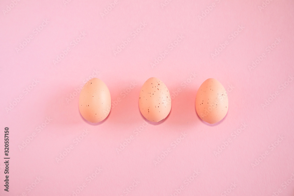 Pink easter eggs on pink background