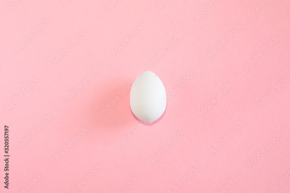 Easter egg on pink background