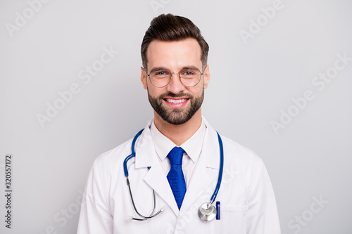 Close-up portrait of his he nice attractive smart clever cheerful cheery doc professor emergency center owner director ceo boss chief isolated on light white gray pastel color background