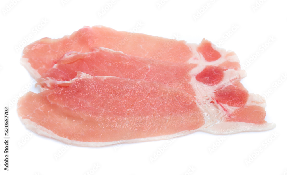 Raw pork meat with parsley herb leaves isolated on white background