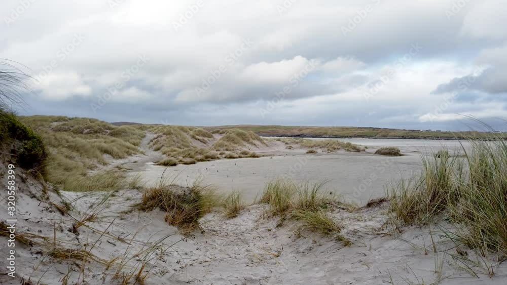 The dunes and beach at Maghera Beach near Ardara, County Donegal - Ireland. The dunes and beach at Maghera Beach near Ardara, County Donegal - Ireland.