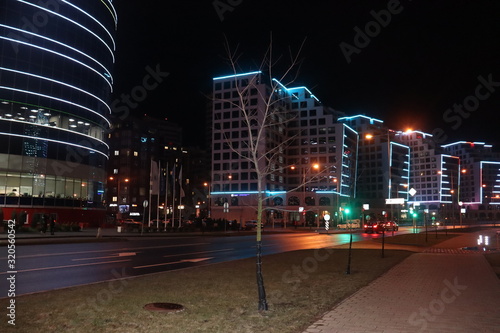 walking at night street in european city