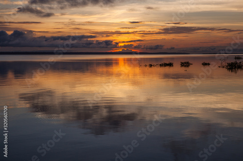 Sunset with the reflection of the sky in the river