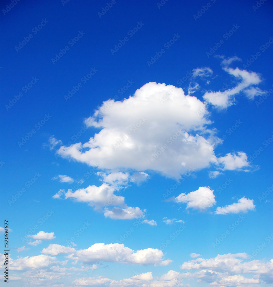Blue sky background with tiny clouds Blue sky background with tiny clouds