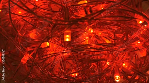 Christmas video, glowing garlands, festive background. Happy holiday celebration. Merry christmas and Happy New Year. Colorful backdrop. Festive background.