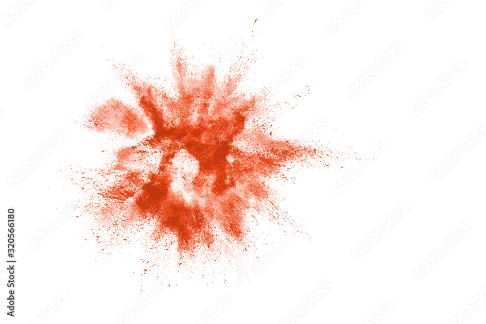 abstract orange powder splatted background. Colorful powder explosion on white background. Colored cloud. Colorful dust explode. Paint Holi.