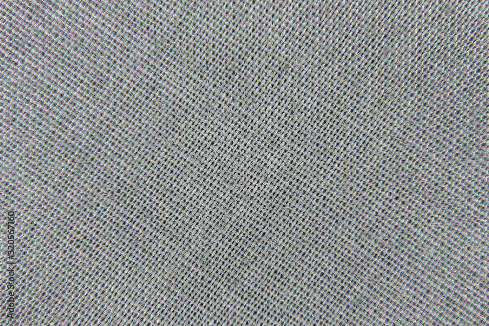 background weaving of gray fabric closeup background weaving of gray fabric closeup