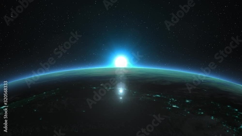 Beautiful view of the Sun rising over Planet Earth. Futuristic blue version. Elements of this 3D animation were furnished by NASA.
