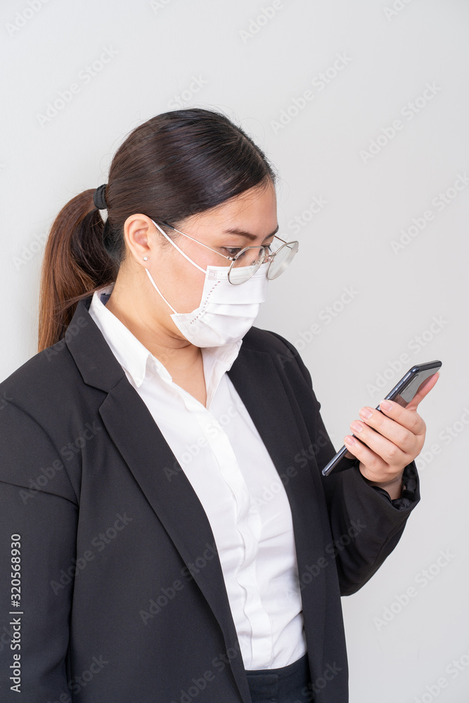 Asian women wearing surgical face mask to prevent flu disease Corona virus and PM 2.5 dust Asian women wearing surgical face mask to prevent flu disease Corona virus and PM 2.5 dust