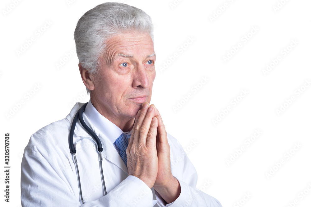 Portrait of senior male doctor with stethoscope Portrait of senior male doctor with stethoscope