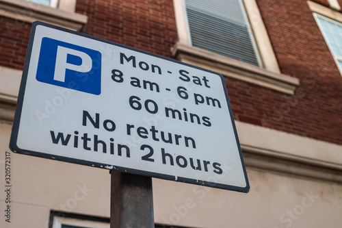 Parking restriction sign