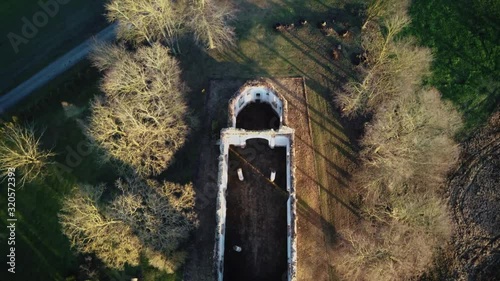 Ruins of the Lutheran Church in Salgale Latvia Near of the Bank of the River Lielupe Aerial View photo