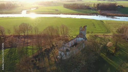 Ruins of the Lutheran Church in Salgale Latvia Near of the Bank of the River Lielupe Aerial View photo