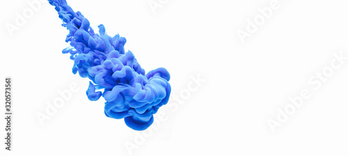 Trendy classic blue ink in water isolated on a white background with copy space