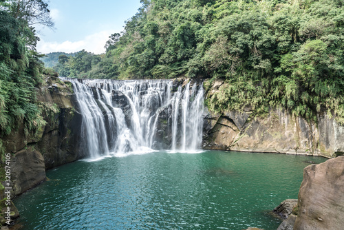 Shihfen Waterfall, Fifteen meters tall and 30 meters wide, It is the largest curtain-type waterfall in Taiwan photo