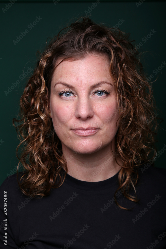 Beautiful woman in front of a background Beautiful woman in front of a background
