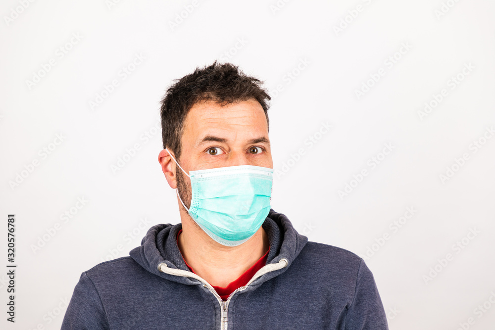 man with a mouthguard isolated against white background man with a mouthguard isolated against white background
