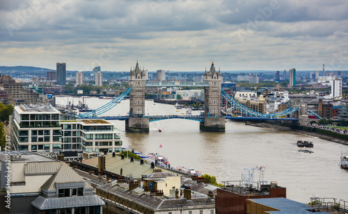 Skyline of East London, London, United Kingdom, from the viewing platform at the top of the Monument with the river Thames and the famous Tower Bridge