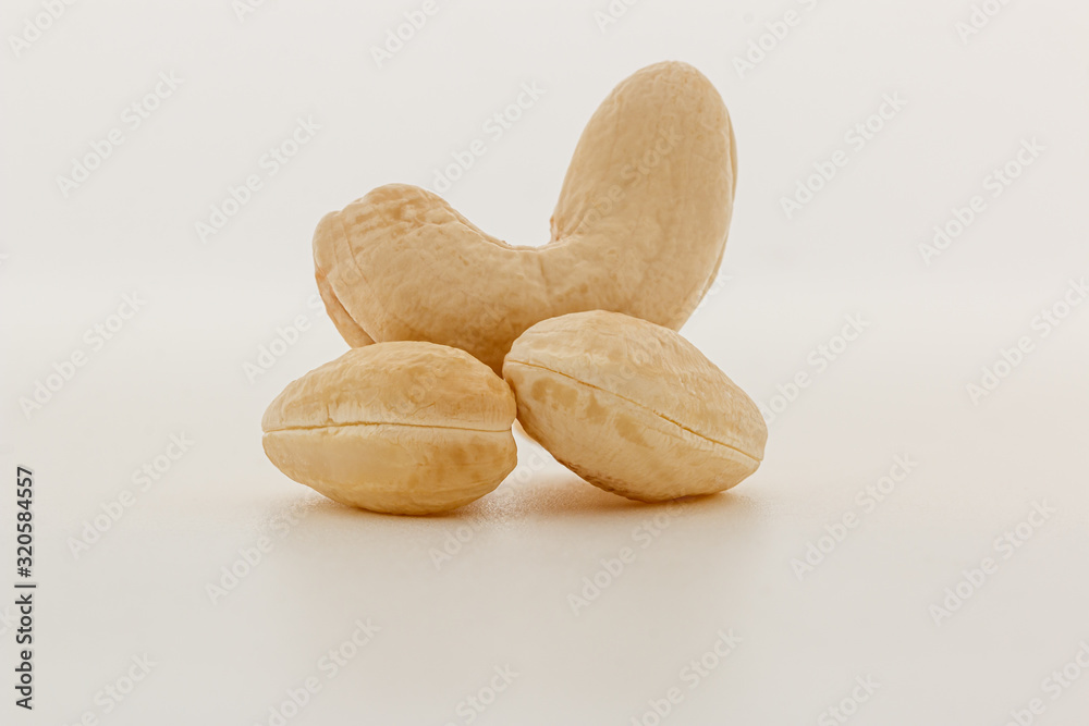 Obraz premium Cashew nut raw on a white background,close up