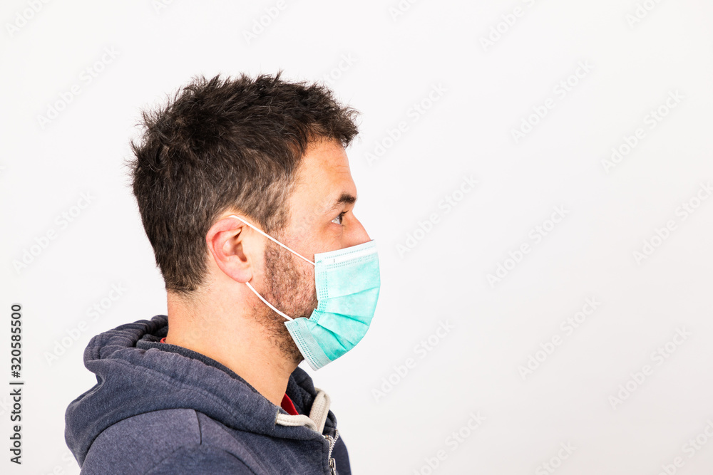 man with a mouthguard isolated against white background man with a mouthguard isolated against white background