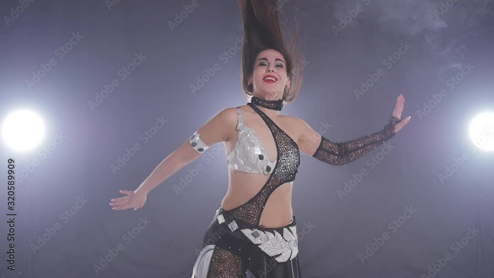 Young beautiful woman dancing belly dance Young beautiful woman dancing belly dance