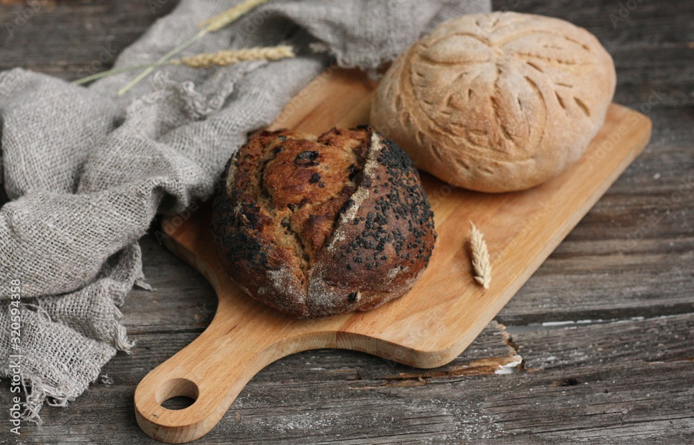 Fresh homemade bread on the table macro Fresh homemade bread on the table macro