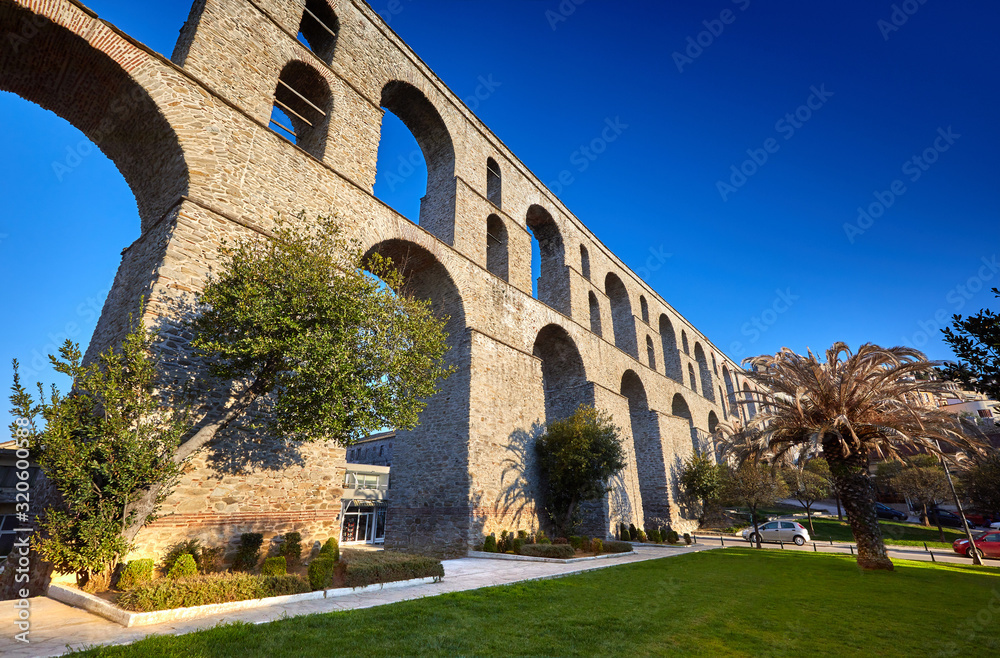 Ancient Roman Aqueduct, Kavala, Greece. View on aqueduct Kamares in the Macedonia, Greece, Europe. Traveling concept background.