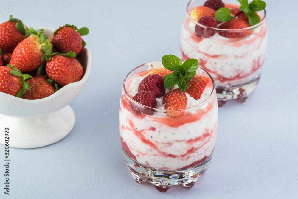 Chia pudding with strawberry sauce and berries. Chia pudding with strawberry sauce and berries.