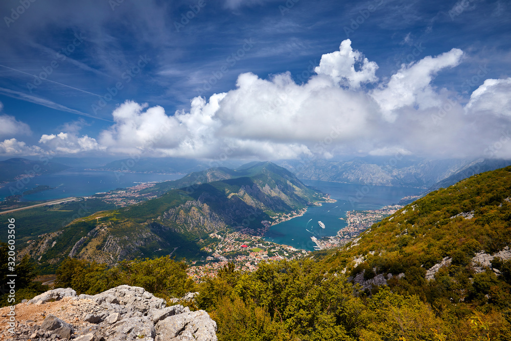 Fantastic aerial panoramic summer view from the mountain to the bay of Kotor, Mediterranean, Balkans, Montenegro, Europe. Traveling concept background. Incredible sunlight. Postcard.