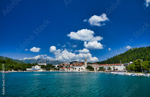 View of Ploce Tower. Sunny summer cityscape of Ploche city, Croatia, Europe. Bright morning seascape of Adriatic sea. Beautiful world of Mediterranean countries. Architecture traveling background..