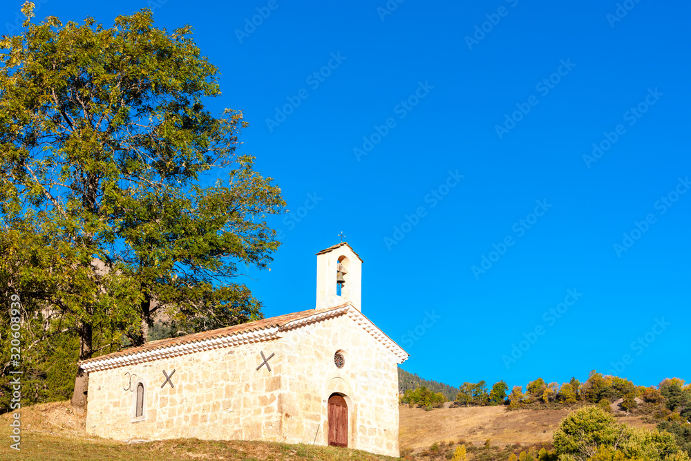 chapel in autumn landscape,  Provence, France