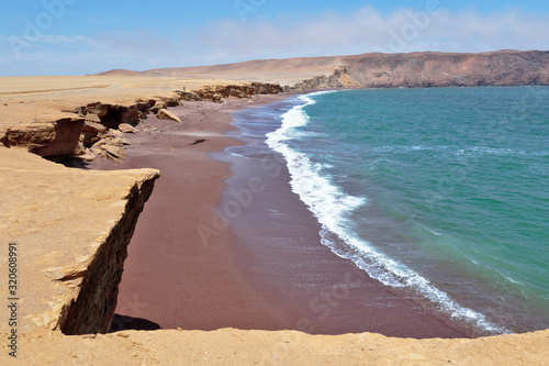 Beautiful view from the shore of the red beach in Paracas, it is an important tourist center. Ica-Peru photo