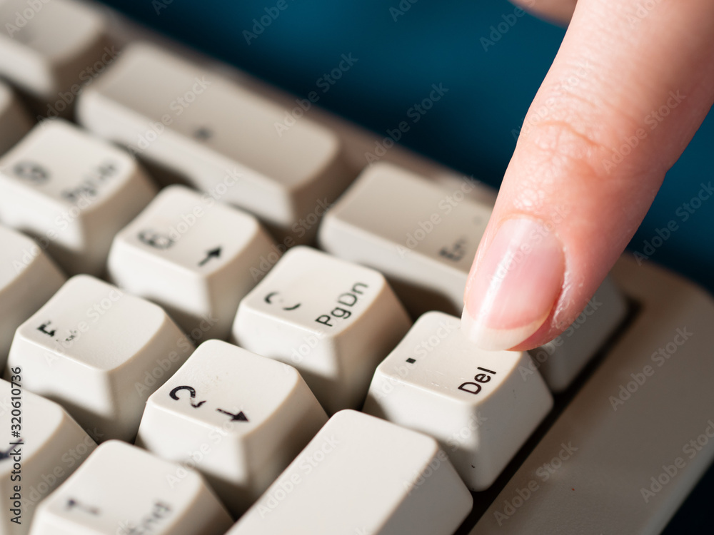 Female forefinger pushes POINT NUMPAD button. Close-up Female forefinger pushes POINT NUMPAD button. Close-up