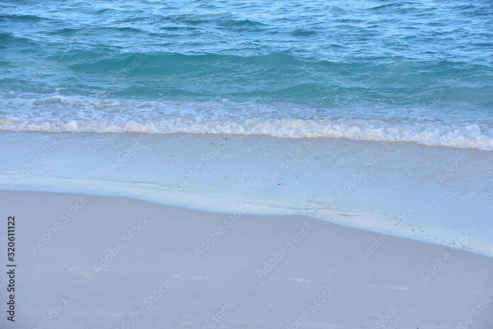 Sandy tropical beach and blue turquoise ocean water Sandy tropical beach and blue turquoise ocean water