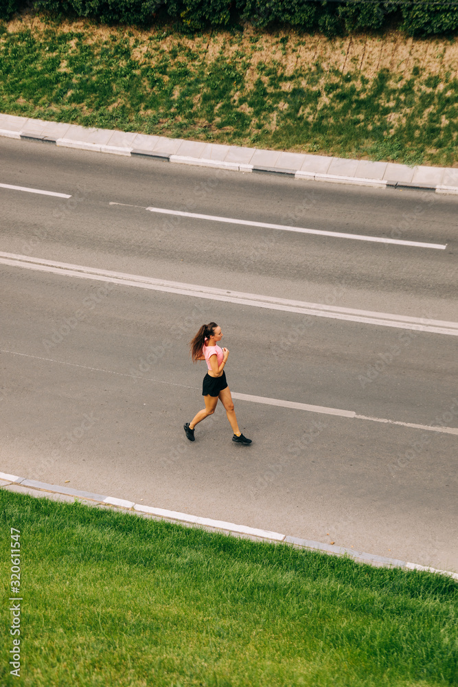 Obraz premium Woman Training On Street