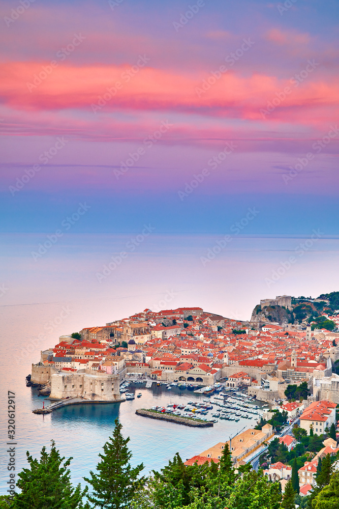 Aerial view at famous european travel destination in Croatia, Dubrovnik old town, Dalmatia, Europe. UNESCO list. Fort Bokar seen from south old walls on a sunny day in dramatic light..