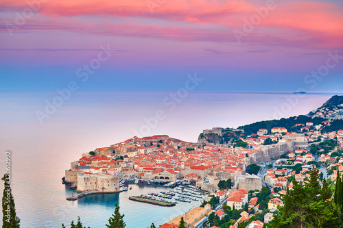 Aerial view at famous european travel destination in Croatia, Dubrovnik old town, Dalmatia, Europe. UNESCO list. Fort Bokar seen from south old walls on a sunny day in dramatic light.. photo
