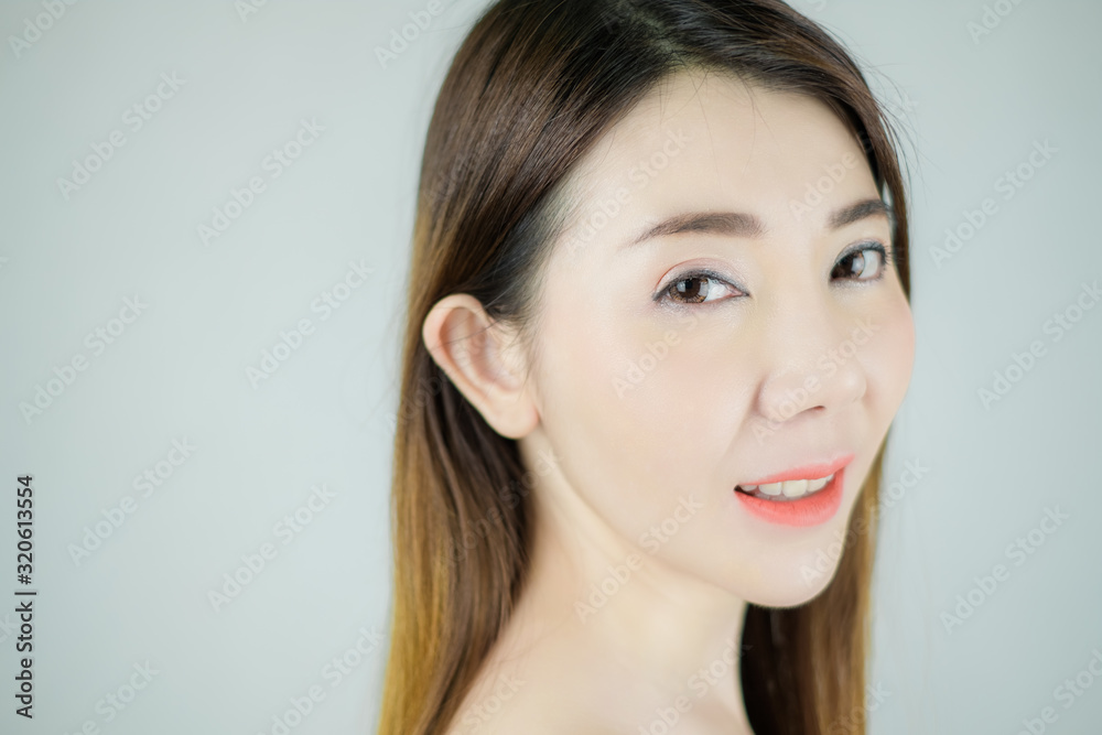 Close-up beautiful face of young asian woman with smooth health fresh skin. isolated on white background. Skin care concept. Close-up beautiful face of young asian woman with smooth health fresh skin. isolated on white background. Skin care concept.