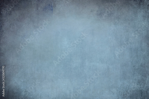 Old blue grungy metallic wall backdrop