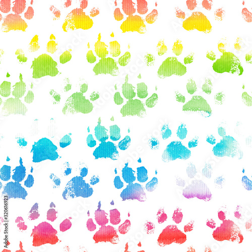 Animal footprint seamless pattern with watercolor rainbow paws.