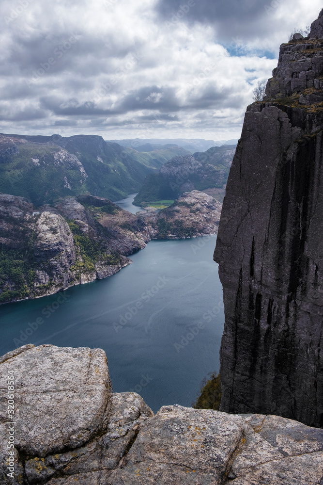 sheer cliff about touristic  path along a steep mountain  to the Rock Preikestolen over lysefjord in Norway