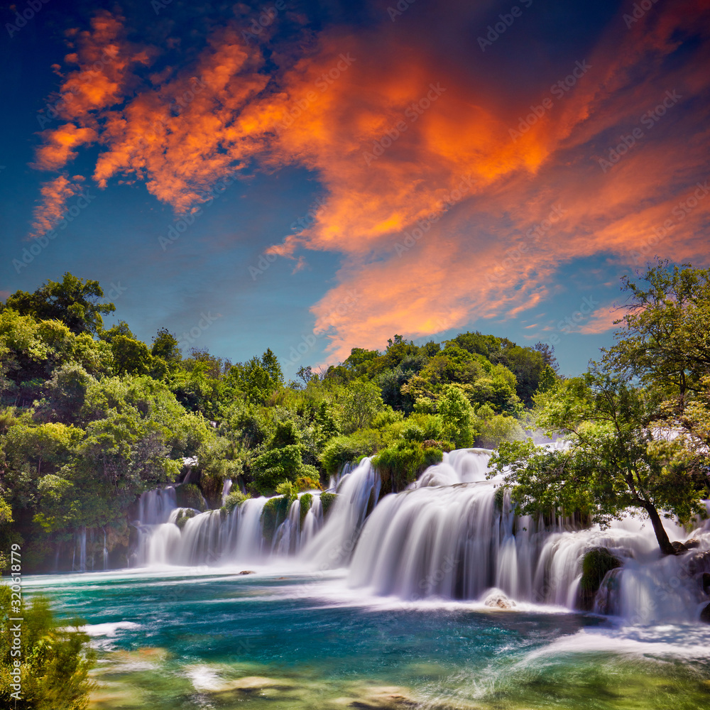 Fototapeta Beautiful Skradinski Buk Waterfall In Krka National Park - Dalmatia Croatia, Europe. Beautiful long exposure panorama of waterfalls (milk effect). A true natural wonder. Amaizing sunlight view.