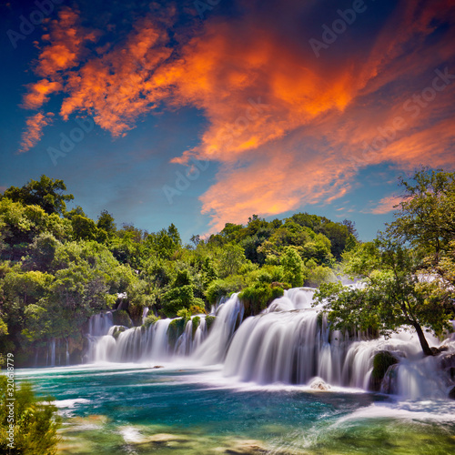 Beautiful Skradinski Buk Waterfall In Krka National Park - Dalmatia Croatia, Europe. Beautiful long exposure panorama of waterfalls (milk effect). A true natural wonder. Amaizing sunlight view. © zicksvift