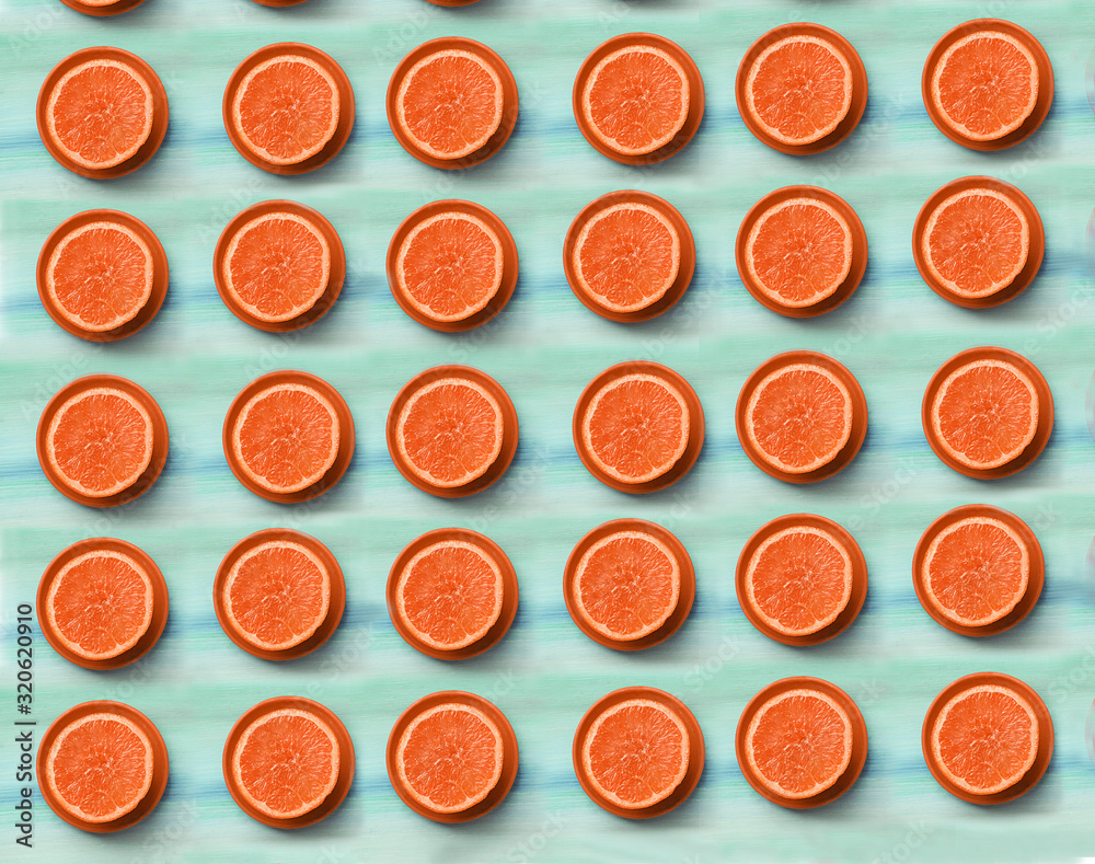 cut orange half on blue wooden board background close up top view photo cut orange half on blue wooden board background close up top view photo