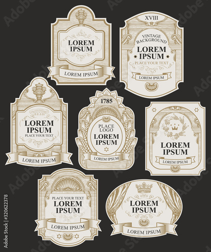 Vector set of ornate labels on the black background in vintage style. Collection of hand-drawn labels decorated by ribbons, crowns, curls in figured frames with place for text and logo