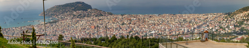 View at the city of sunny Alanya from above  one of its mountains. © Garmon