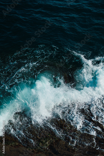 Sea ​​waves breaking against the rocks